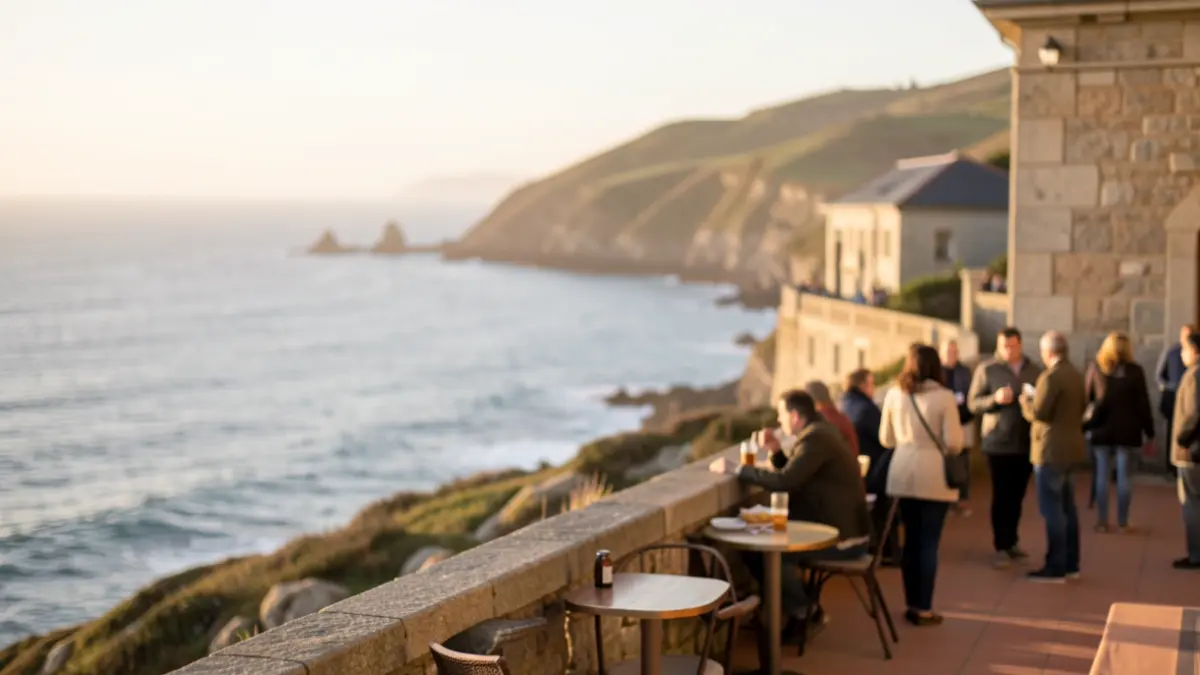Imaxe xenérica dunha terraza con vistas ao mar na Coruña, con arquitectura de granito e luz de tarde.